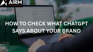 Photo of a person using ChatGPT on their laptop, checking to see what it says.